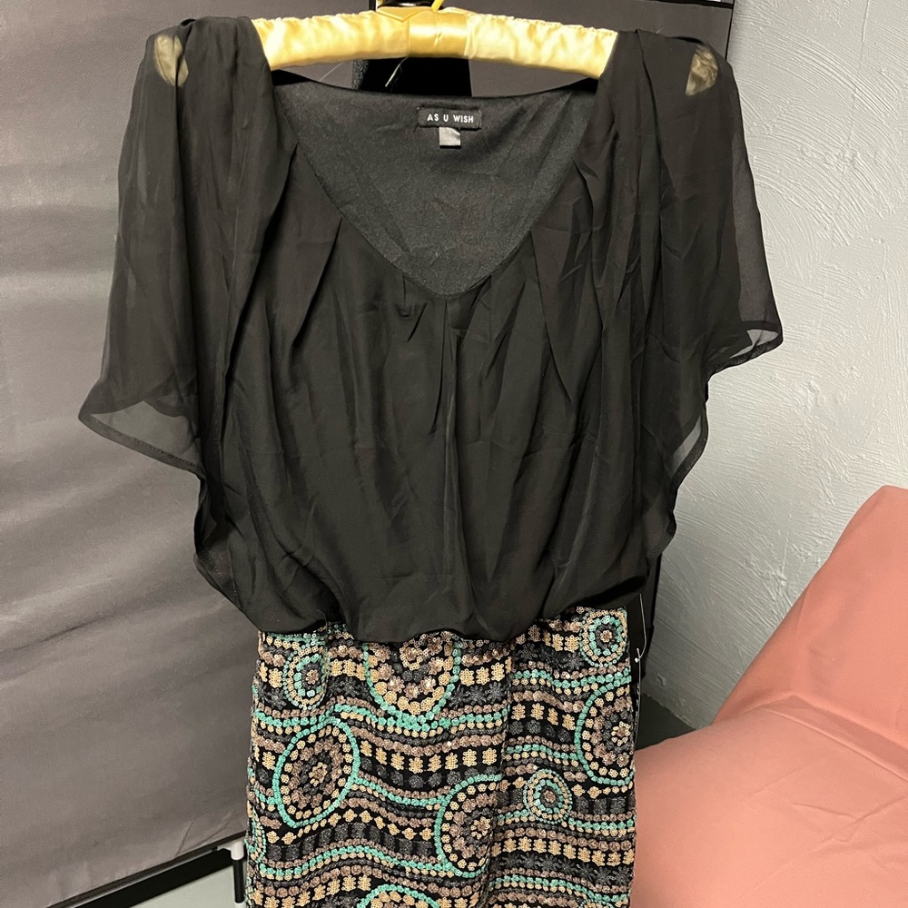Beautiful new black with blue/green dress. Size small.